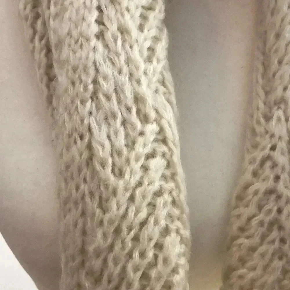 Treasure an Bond‎ white scarf.